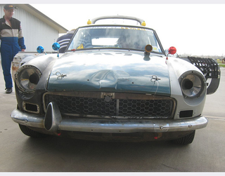 Illustration for article titled Guess The 24 Hours Of LeMons Lap Totals, Win Fabulous Prizes: Opel GT or MGB-GT?